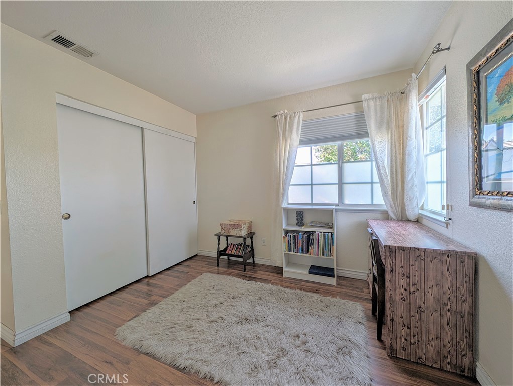 1738 Cambridge Circle Redlands, CA 92374 - Photo 50 of 59 a view of a livingroom with furniture and windows