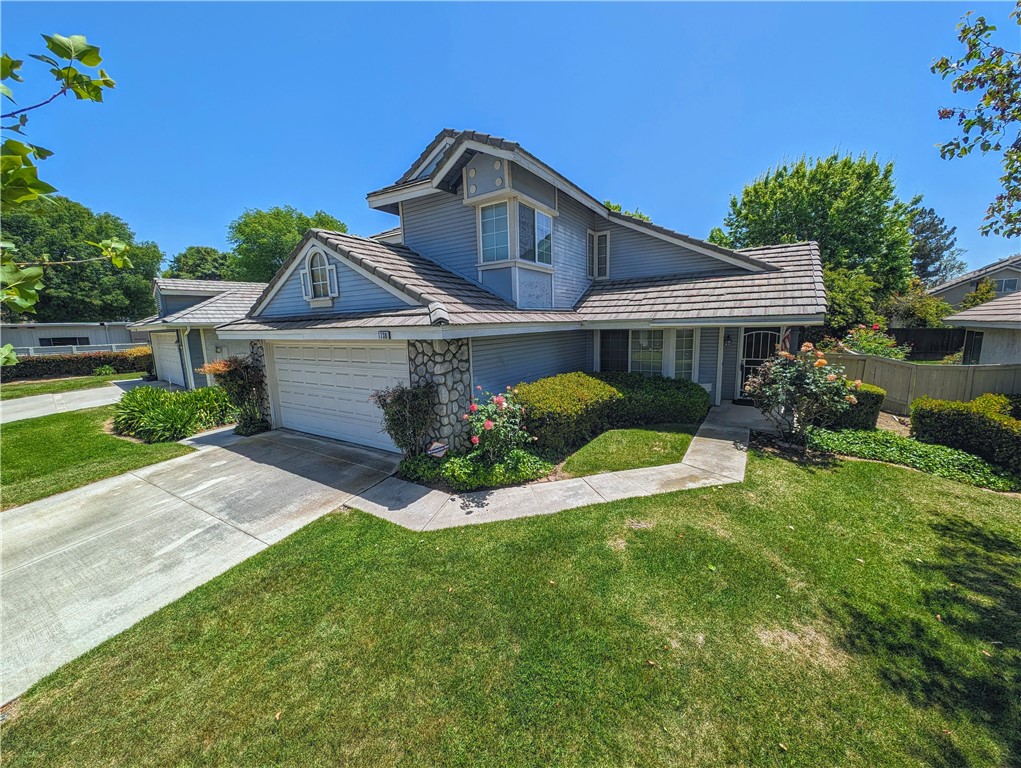 1738 Cambridge Circle Redlands, CA 92374 - Photo 57 of 59 a front view of a house with a yard