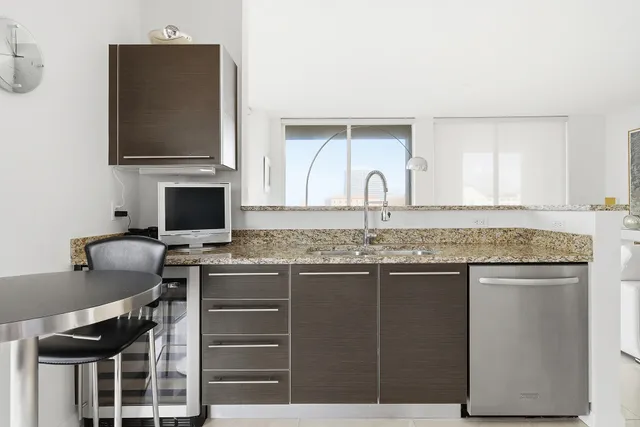 a kitchen with a stove and a microwave