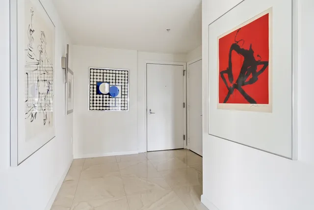 an entryway with a workspace