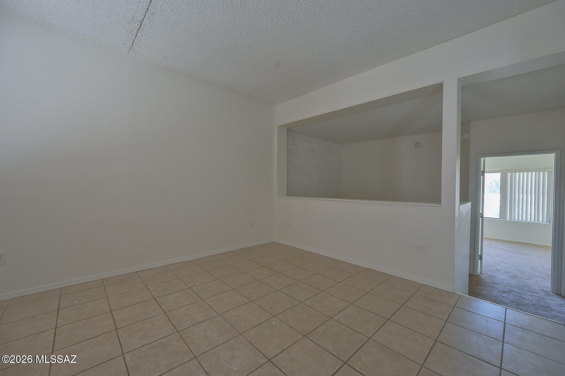 7777 East Golf Links Road, Unit 2308 Tucson, AZ 85730 - Photo 12 of 37 wooden floor in an empty room