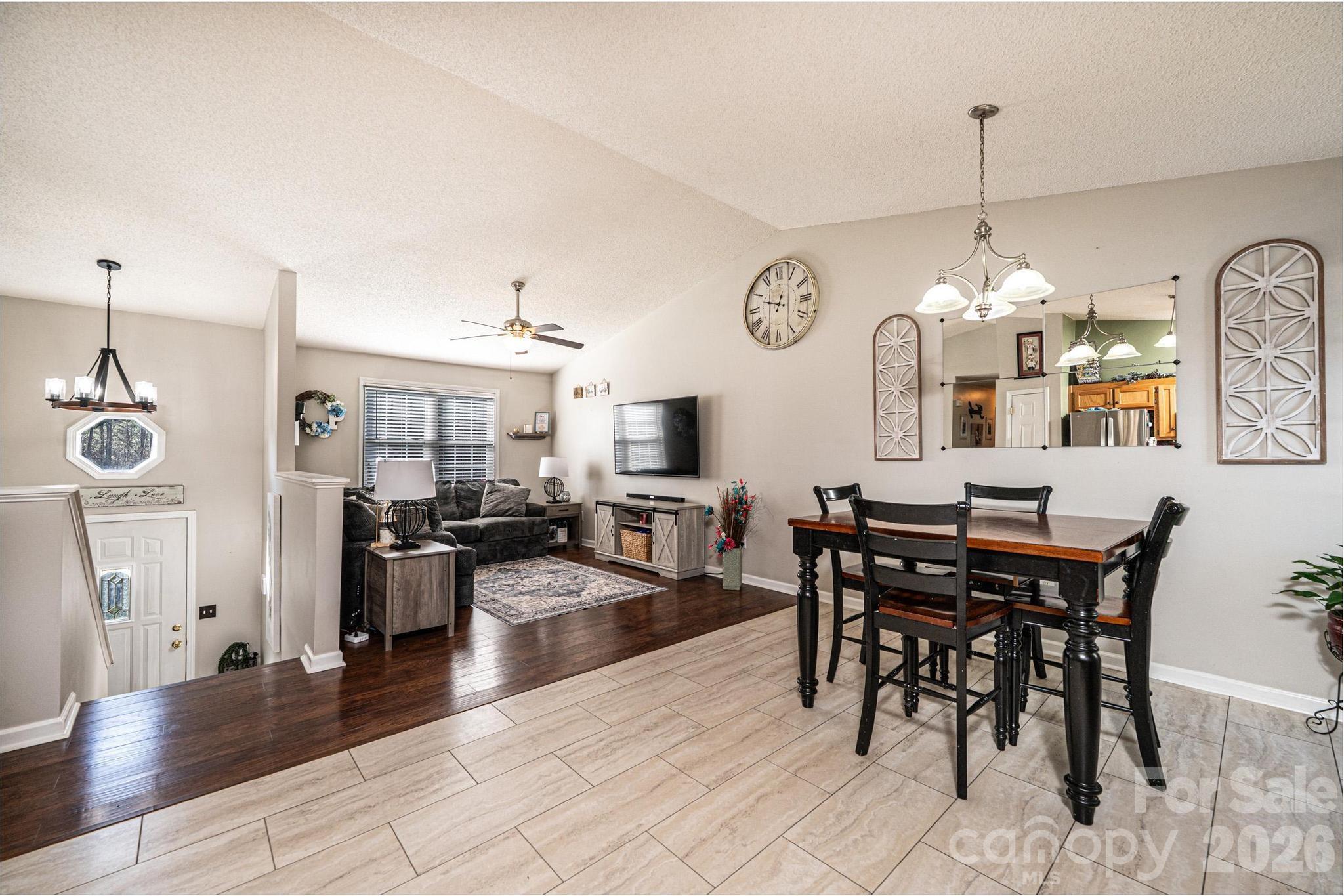 4984 Addison Lane Hickory, NC 28601 - Photo 11 of 32 a view of a dining room with furniture window and wooden floor