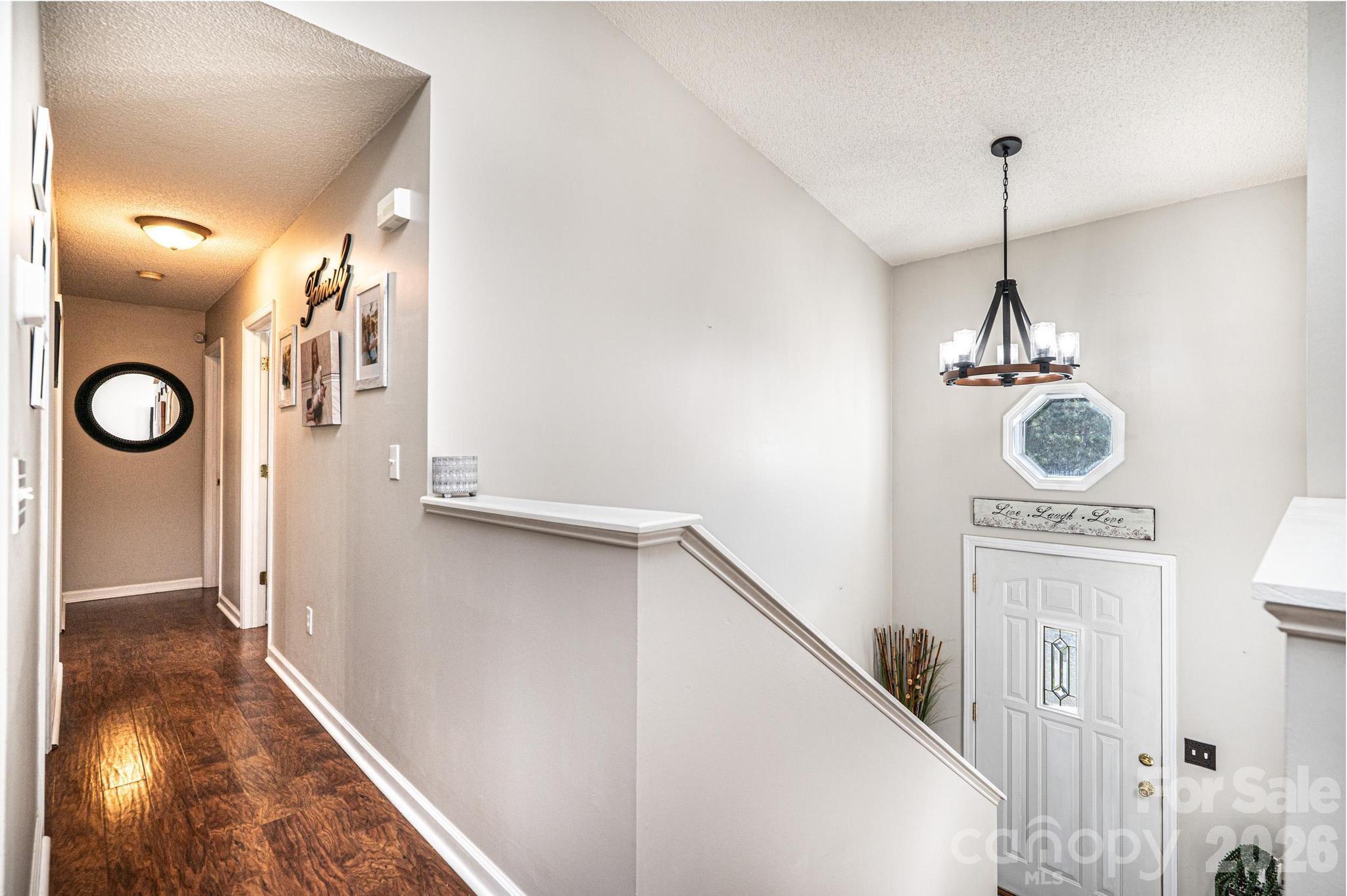 4984 Addison Lane Hickory, NC 28601 - Photo 12 of 32 a view of a hallway with windows