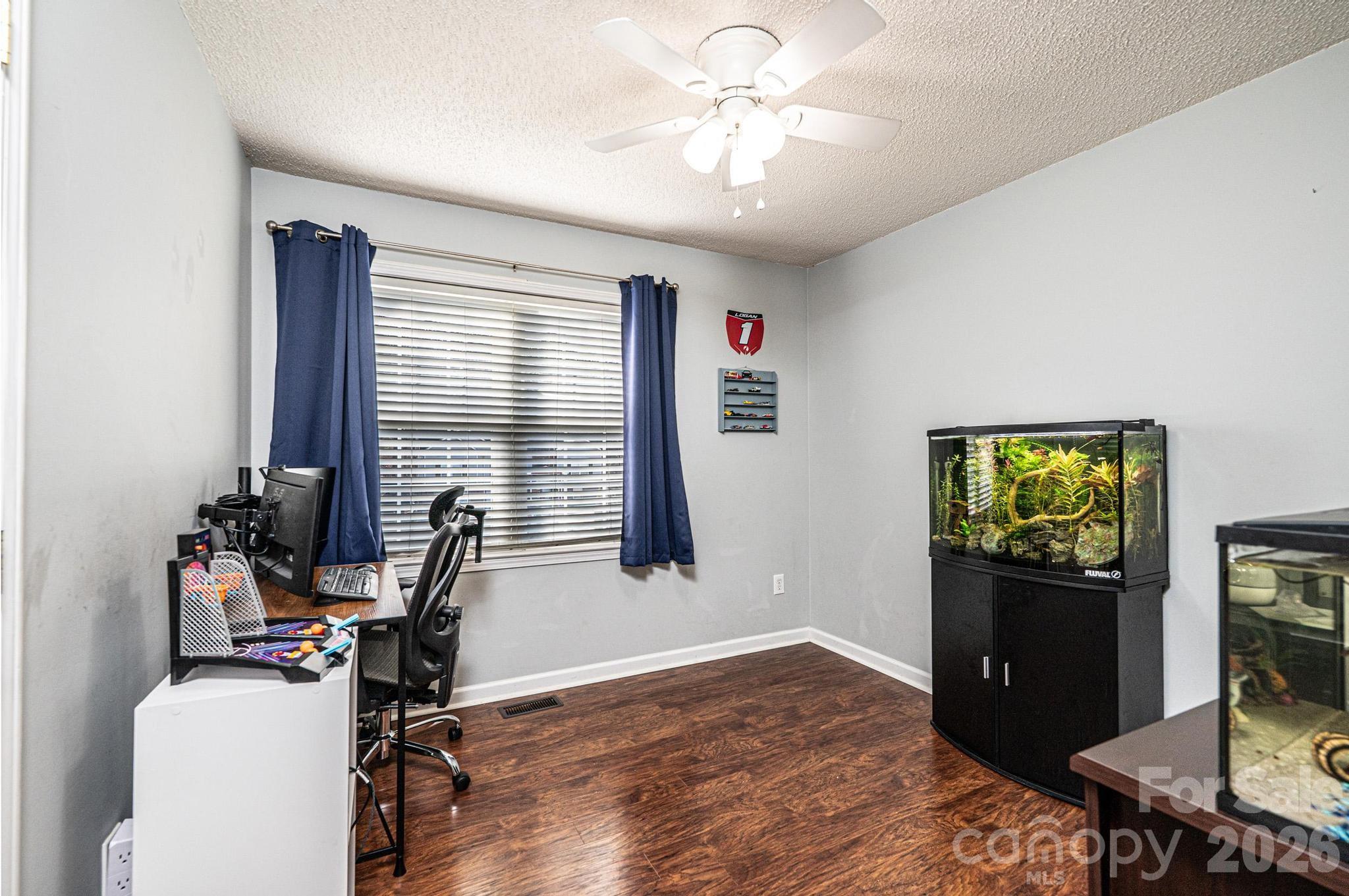 4984 Addison Lane Hickory, NC 28601 - Photo 19 of 32 a view of a workspace with furniture and a window