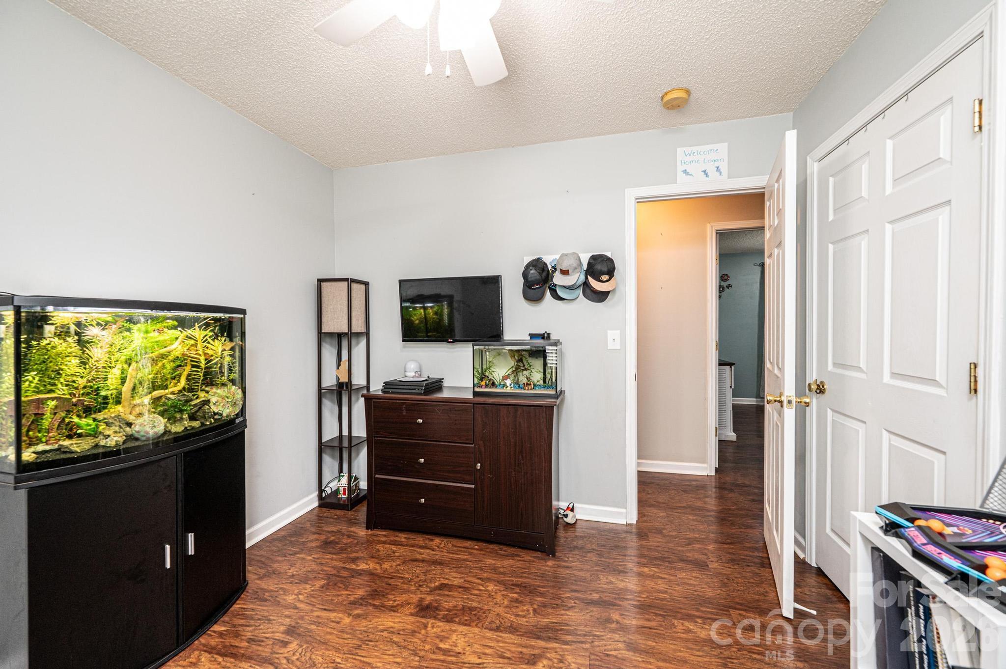 4984 Addison Lane Hickory, NC 28601 - Photo 20 of 32 a living room with furniture and a flat screen tv