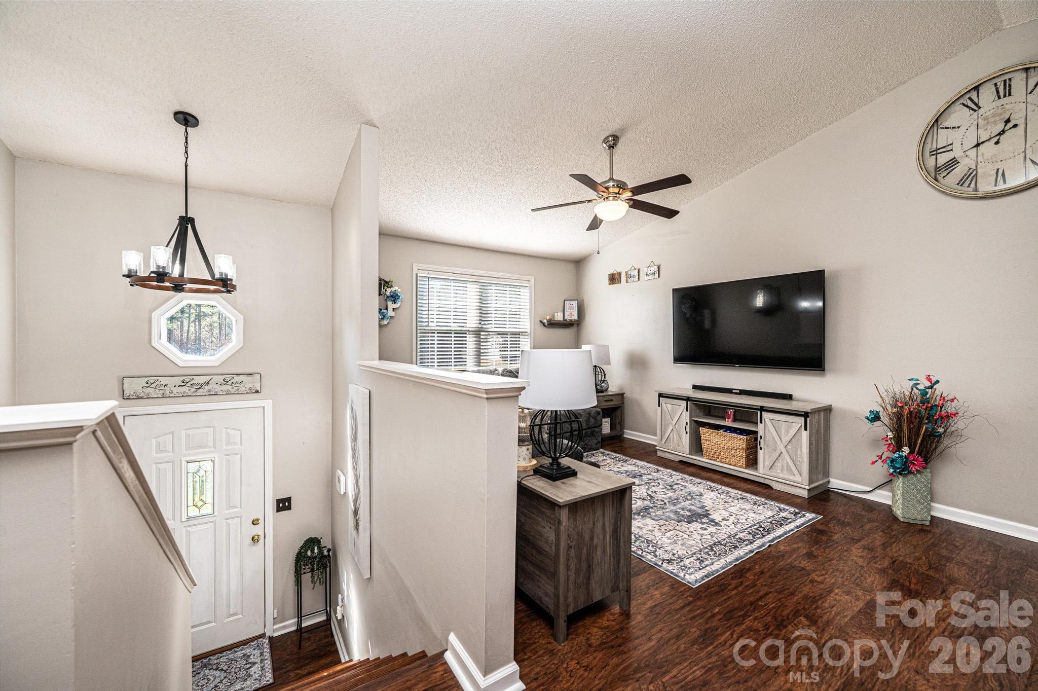 4984 Addison Lane Hickory, NC 28601 - Photo 21 of 32 a living room with furniture and a flat screen tv