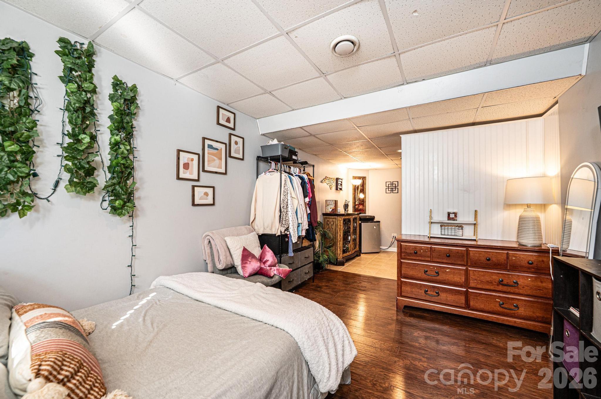 4984 Addison Lane Hickory, NC 28601 - Photo 27 of 32 a bed room with a bed and a walk in closet