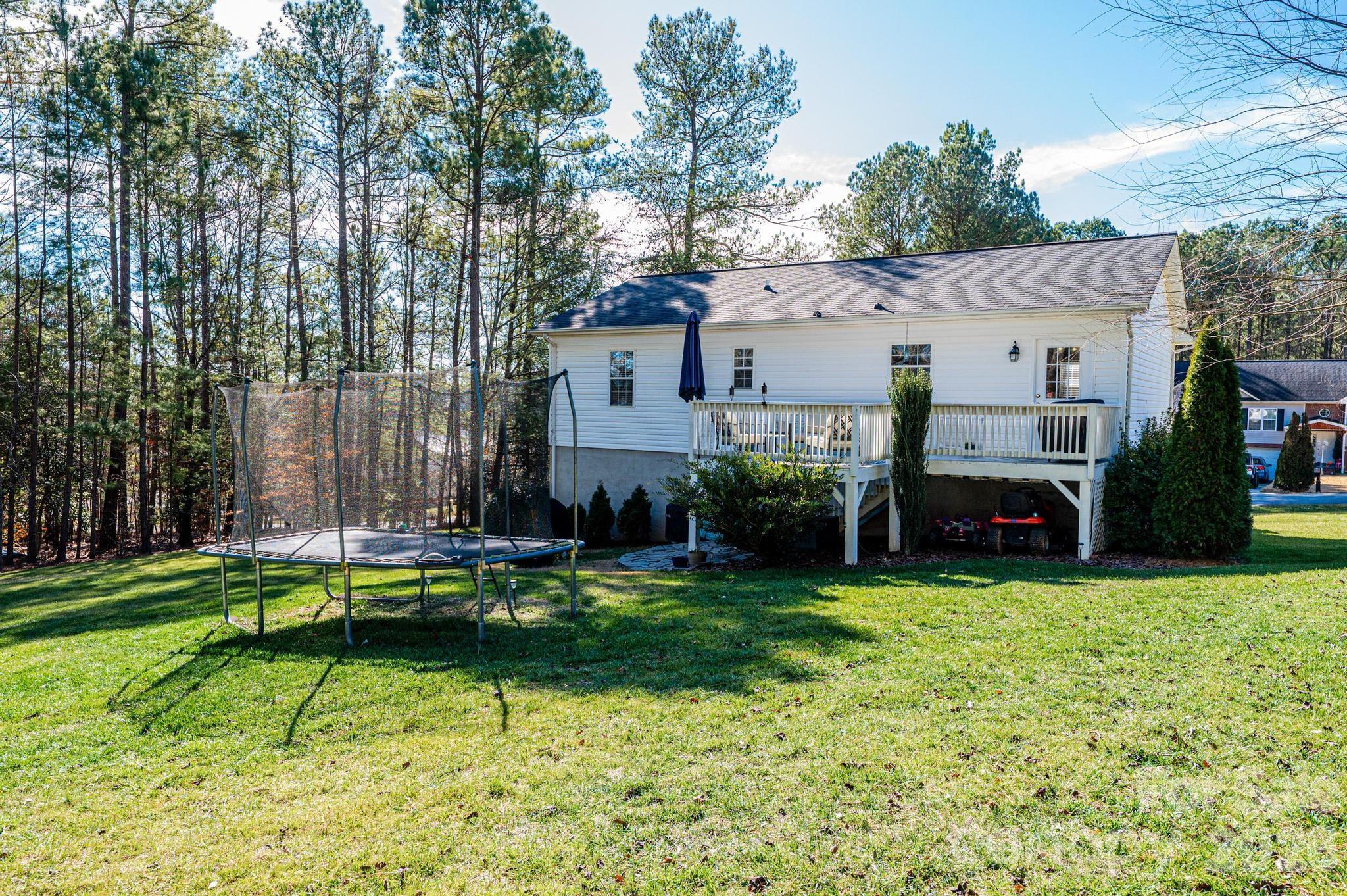 4984 Addison Lane Hickory, NC 28601 - Photo 31 of 32 a view of a house with backyard and sitting area