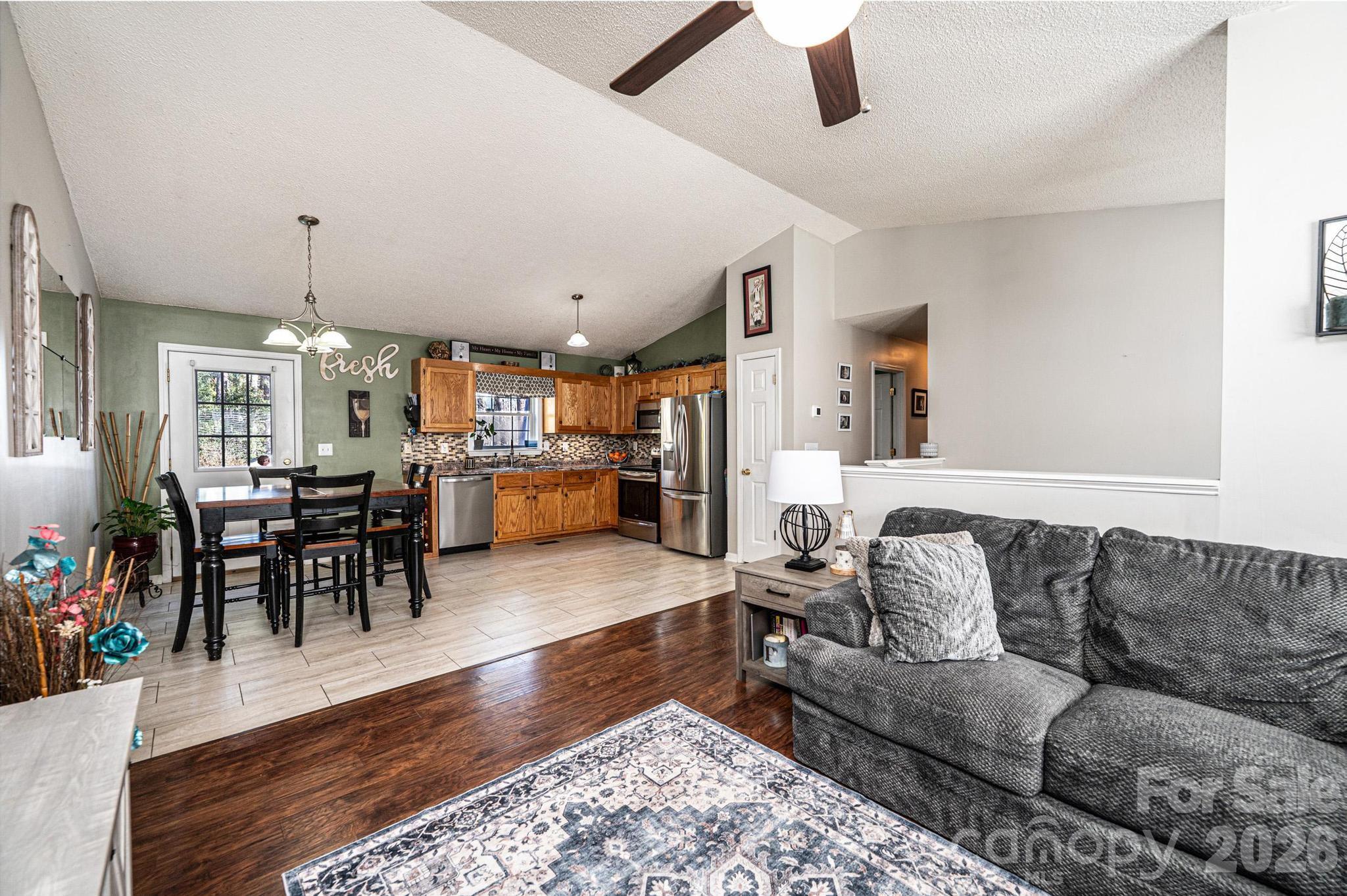 4984 Addison Lane Hickory, NC 28601 - Photo 5 of 32 a living room with furniture and wooden floor