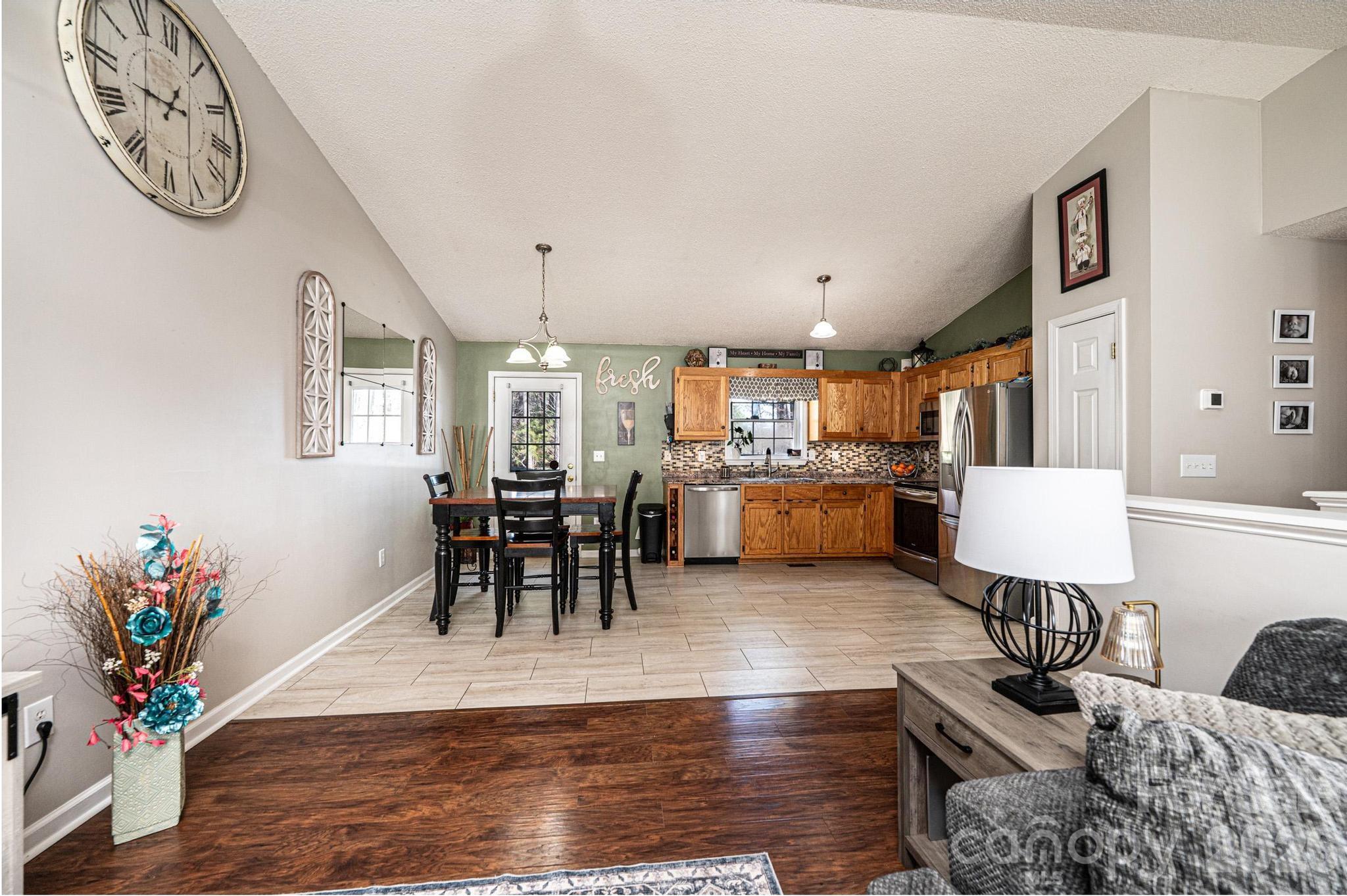 4984 Addison Lane Hickory, NC 28601 - Photo 6 of 32 a living room with furniture and wooden floor