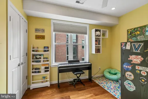 a room with furniture and a window