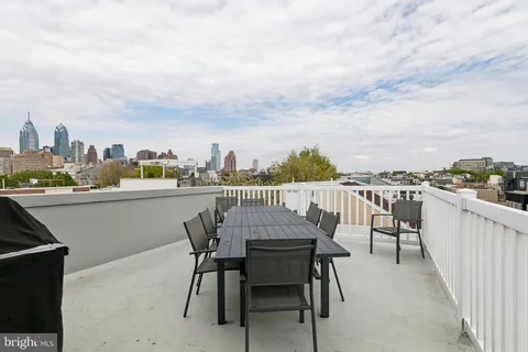 a view of a terrace with furniture
