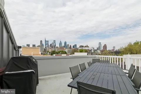 a view of a terrace with city view