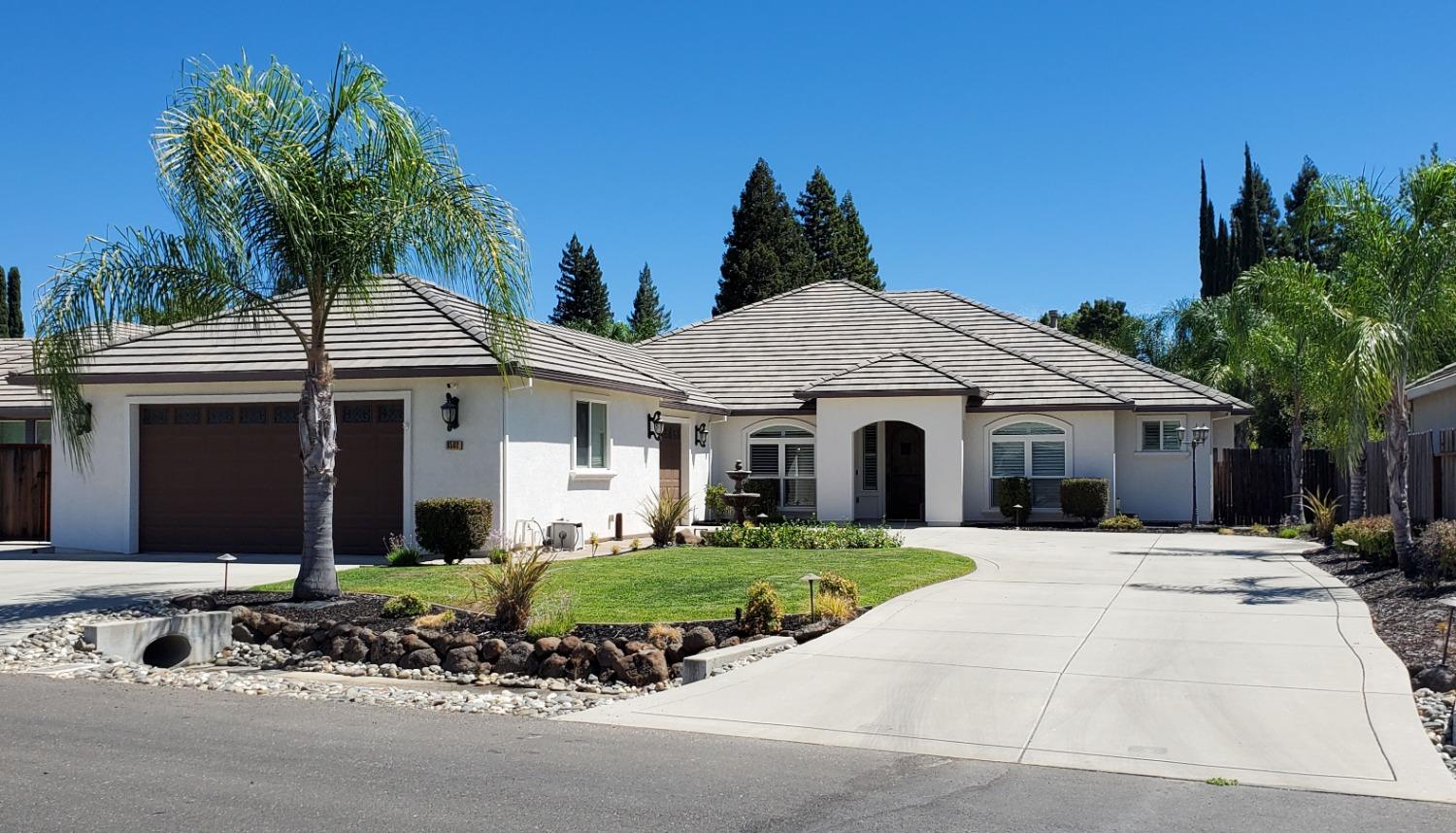 9592 Sprow Ranch Lane Orangevale, CA 95662 - Photo 1 of 1 a front view of a house with a yard and potted plants