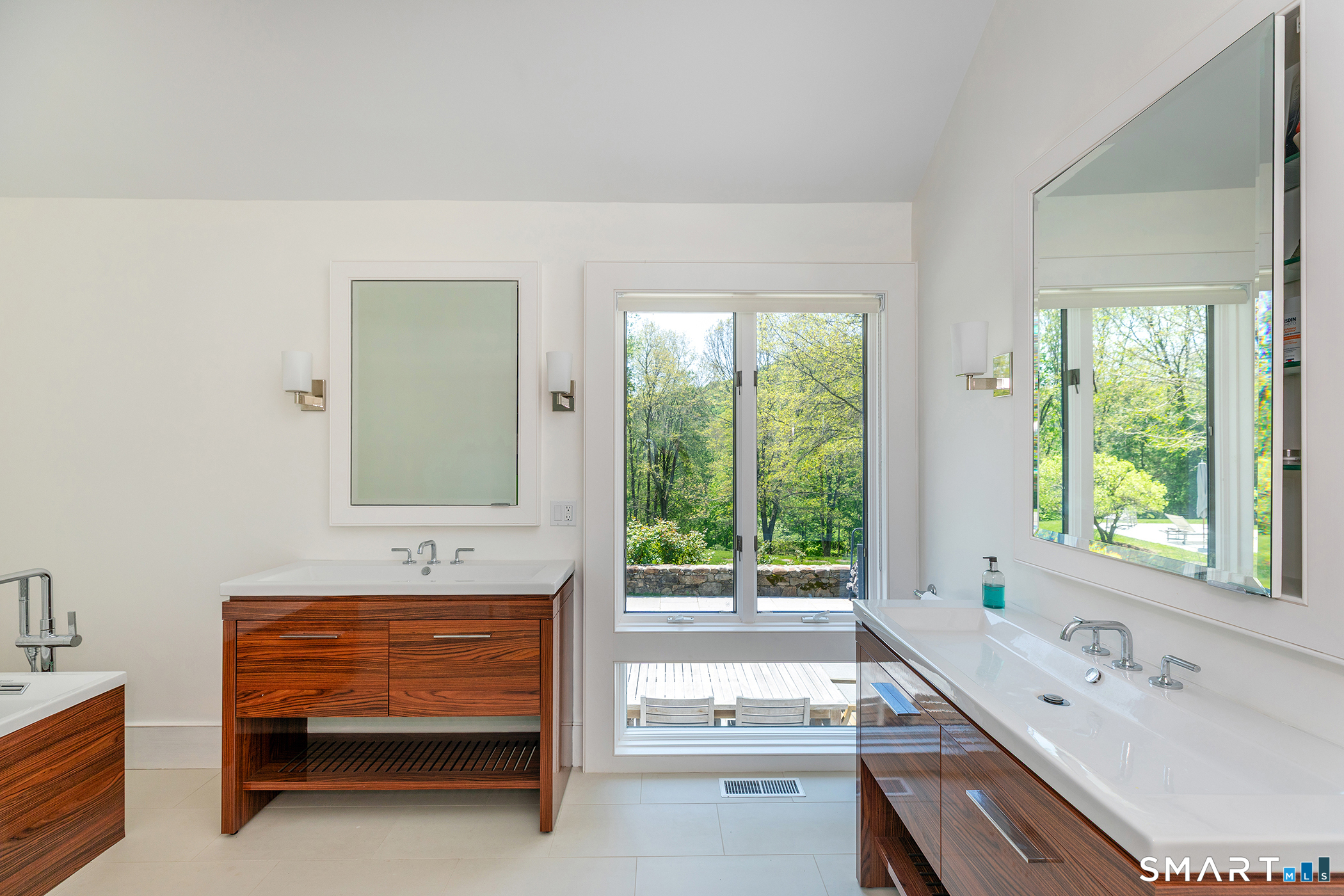 47 Squire Road Roxbury, CT 06783 - Photo 14 of 27 a bathroom with a sink and a window