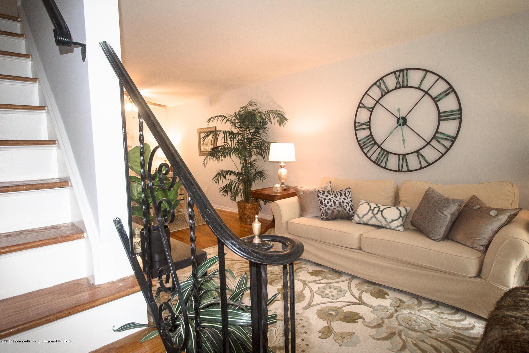 321 Spring Street, Unit 7 Red Bank, NJ 07701 - Photo 2 of 17 a living room with furniture and a window