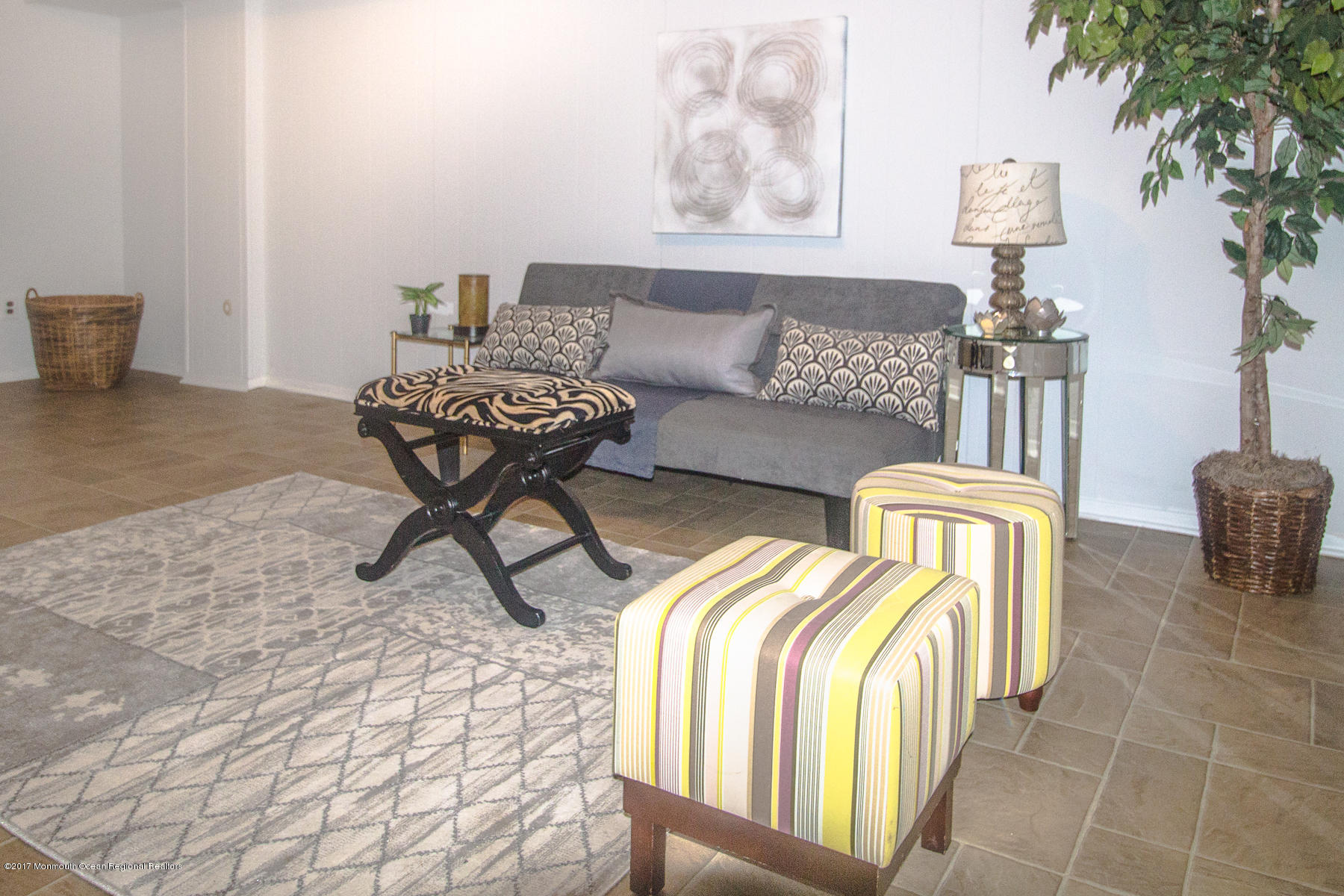321 Spring Street, Unit 7 Red Bank, NJ 07701 - Photo 12 of 17 a living room with furniture and a lamp