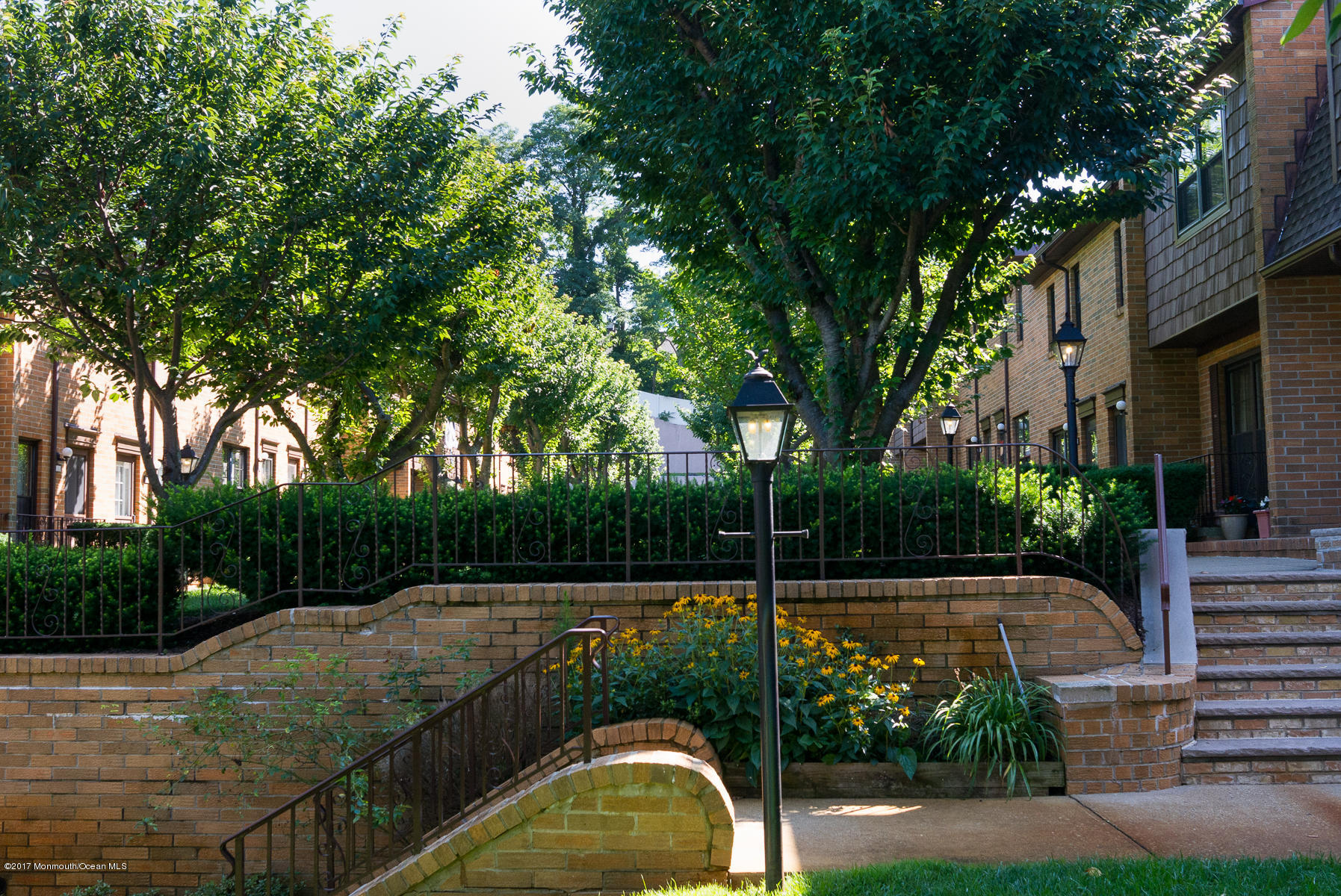 321 Spring Street, Unit 7 Red Bank, NJ 07701 - Photo 15 of 17 a view of a swimming pool with a patio