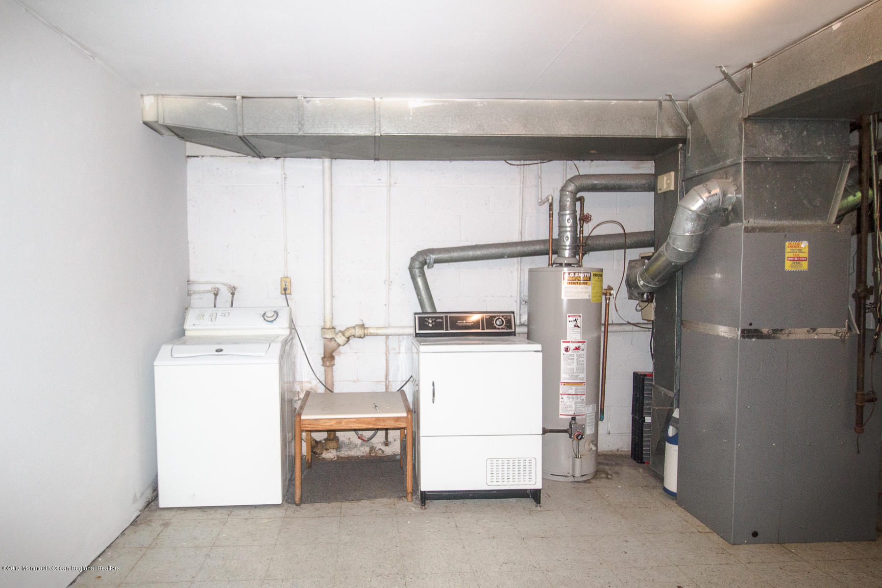 321 Spring Street, Unit 7 Red Bank, NJ 07701 - Photo 17 of 17 a utility room with dryer and washer