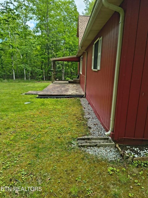 5321 Pawnee Road Crossville, TN 38572 - Photo 8 of 11 a view of a back yard of the house