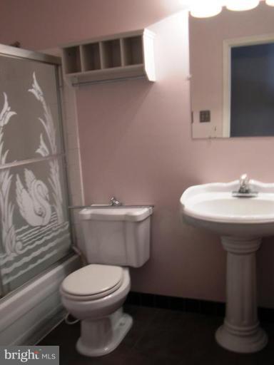 6812 Ben Franklin Road Springfield, VA 22150 - Photo 8 of 14 New remodeled bath w/ceramic tile