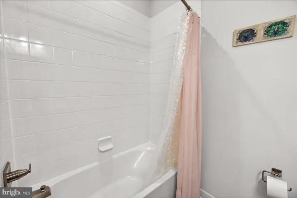 a bathroom with a bathtub