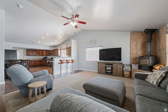348 North Lodge Road Central, UT 84722 - Photo 19 of 25 Living room with a ceiling fan, a wood stove, and recessed lighting