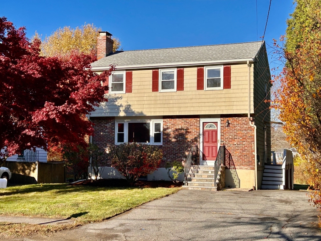 72 Grassland Street Lexington, MA 02421 - Photo 1 of 37 a view of a house with a yard and tree s