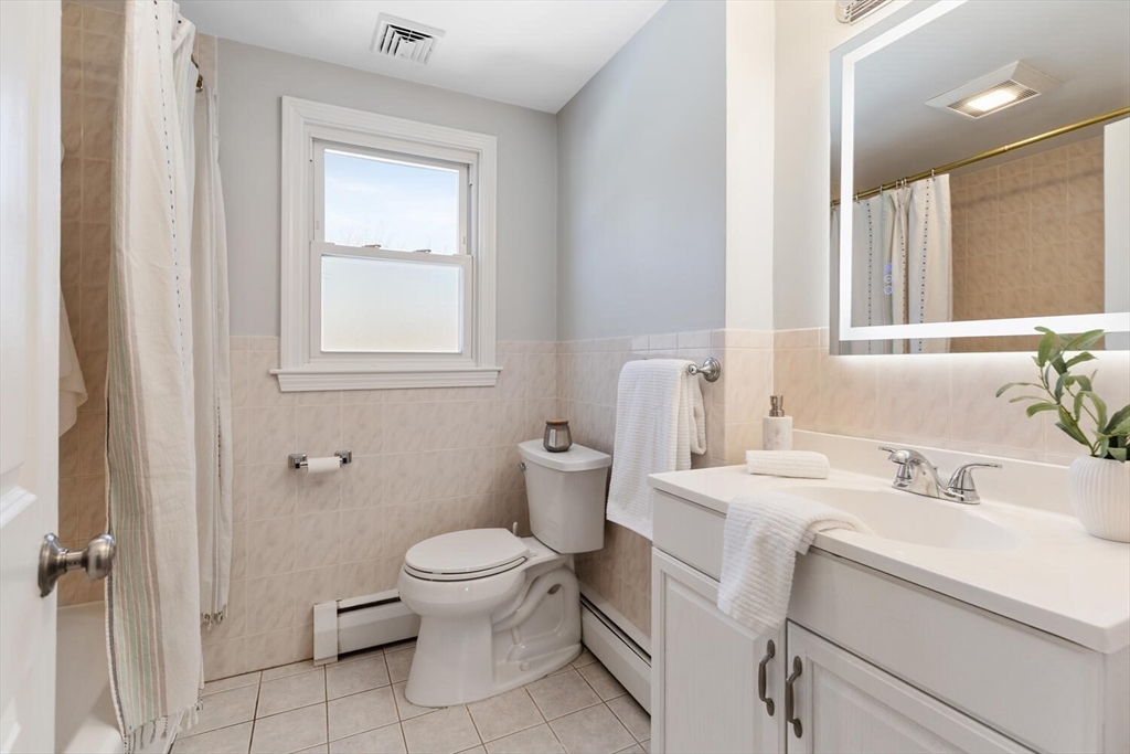 72 Grassland Street Lexington, MA 02421 - Photo 17 of 37 a bathroom with a sink toilet and shower