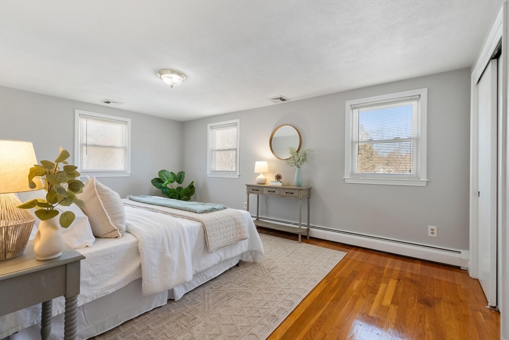 72 Grassland Street Lexington, MA 02421 - Photo 19 of 37 a bedroom with a bed and window