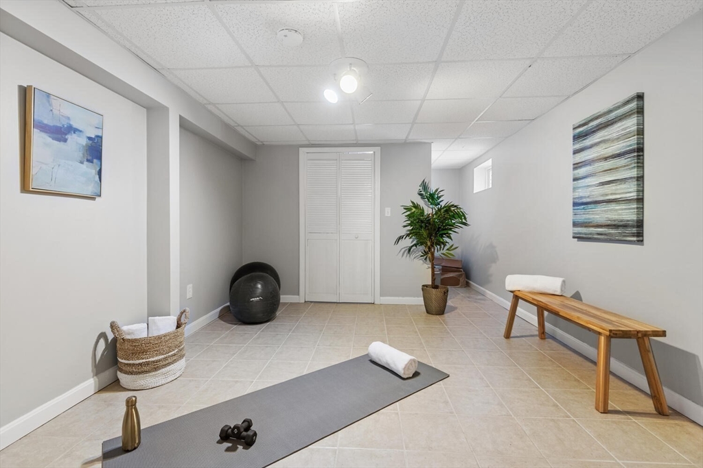 72 Grassland Street Lexington, MA 02421 - Photo 27 of 37 a view of a room with gym equipment