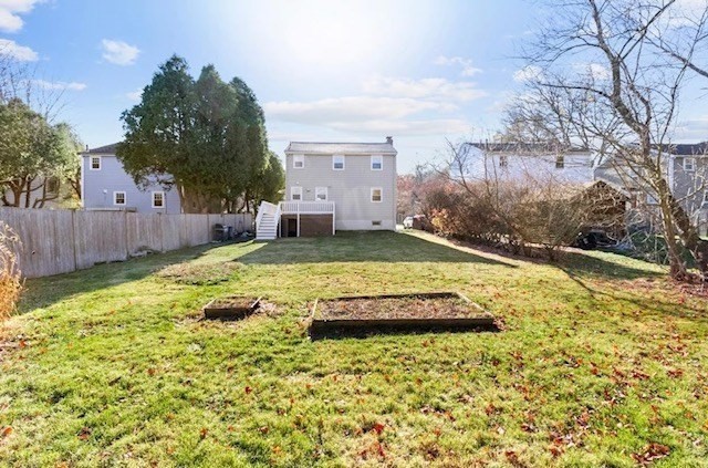 72 Grassland Street Lexington, MA 02421 - Photo 32 of 37 a view of a garden with large tree