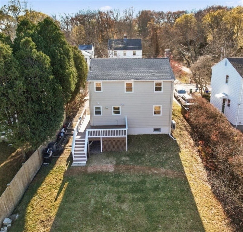 72 Grassland Street Lexington, MA 02421 - Photo 34 of 37 a view of a house with a yard