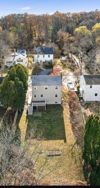 72 Grassland Street Lexington, MA 02421 - Photo 36 of 37 a view of a houses with a yard