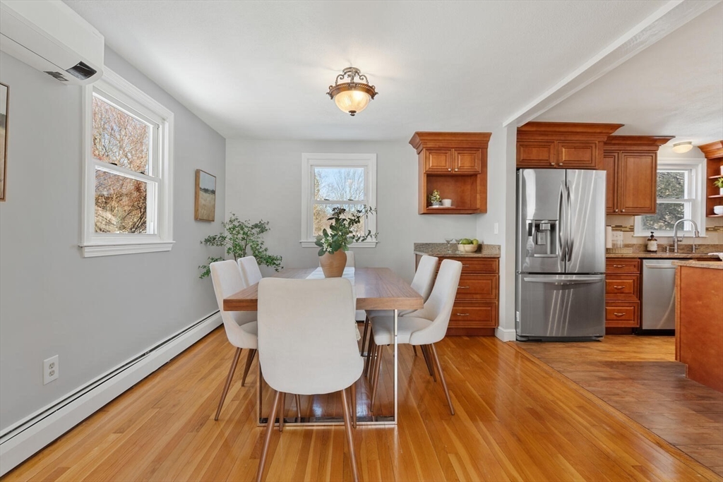 72 Grassland Street Lexington, MA 02421 - Photo 7 of 37 a view of a dining room with furniture window and wooden floor