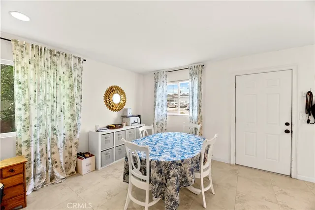 a bed room with a bed and a view of closet