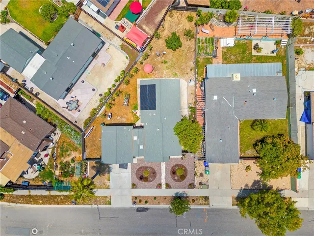 an aerial view of residential house with outdoor space