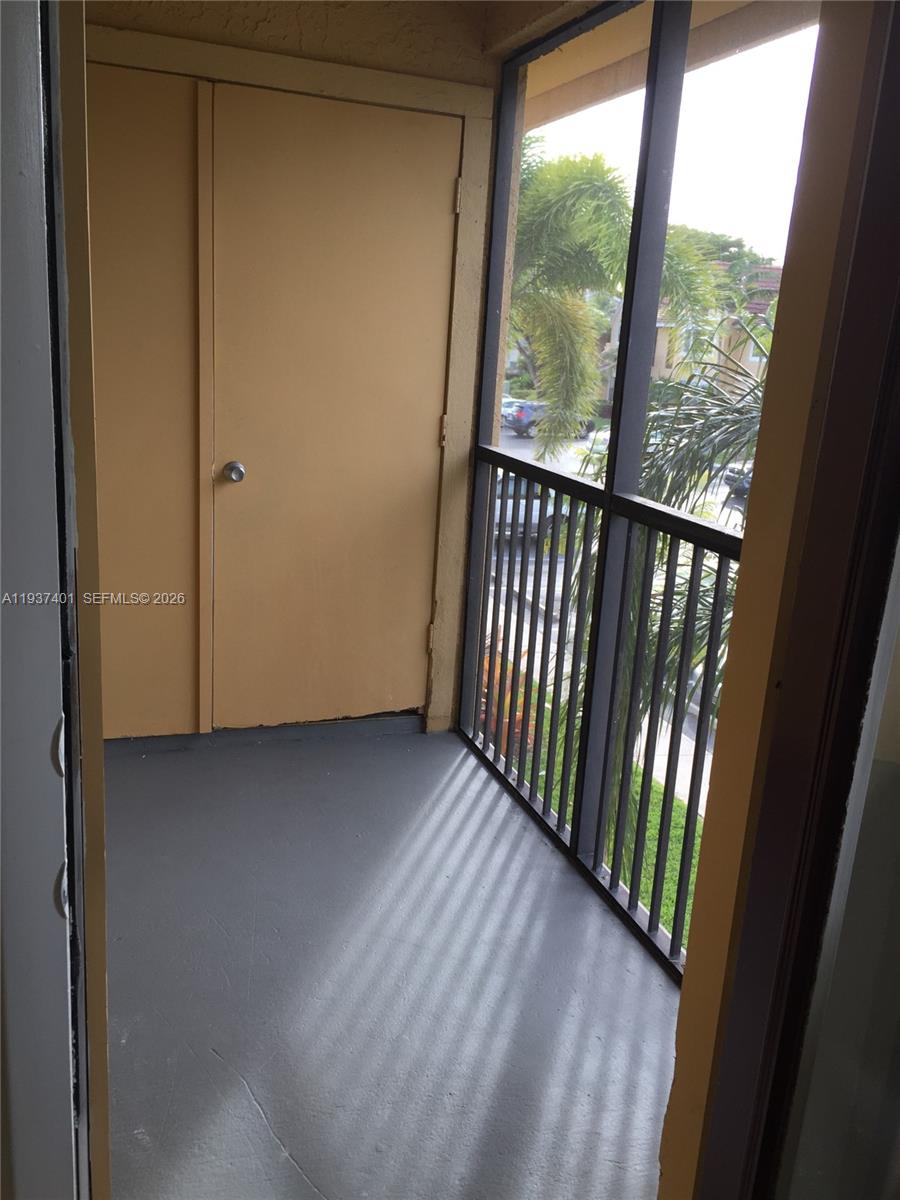 10441 Southwest 156th Court, Unit 421 Miami, FL 33196 - Photo 16 of 36 a view of a porch