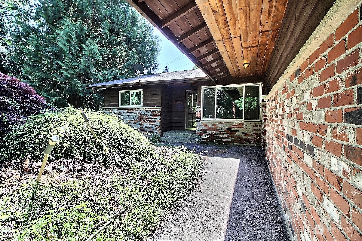 21123 West Richmond Road Bothell, WA 98021 - Photo 1 of 29 a front view of a house with a yard