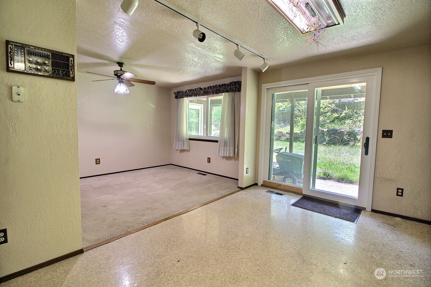21123 West Richmond Road Bothell, WA 98021 - Photo 9 of 29 a view of an empty room with a window