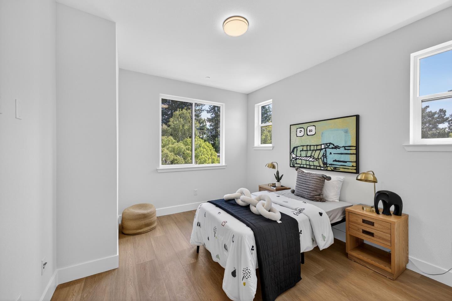 955 Woodside Road Redwood City, CA 94061 - Photo 35 of 46 a bedroom with bed and a window