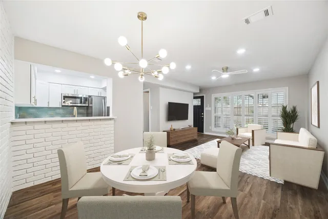 a view of a dining room with furniture