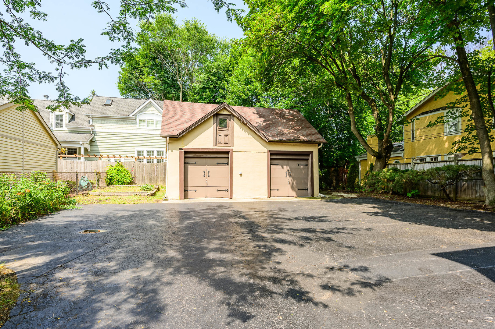 104 Washington Road Lake Forest, IL 60045 - Photo 17 of 17 a front view of a house with a yard and garage