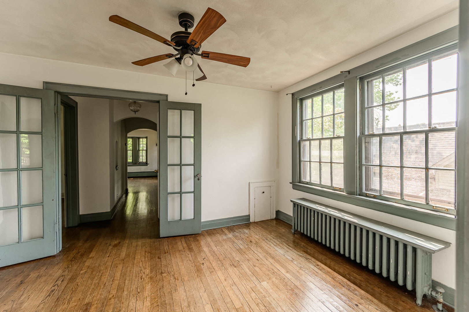 104 Washington Road Lake Forest, IL 60045 - Photo 9 of 17 a view of empty room with wooden floor and fan
