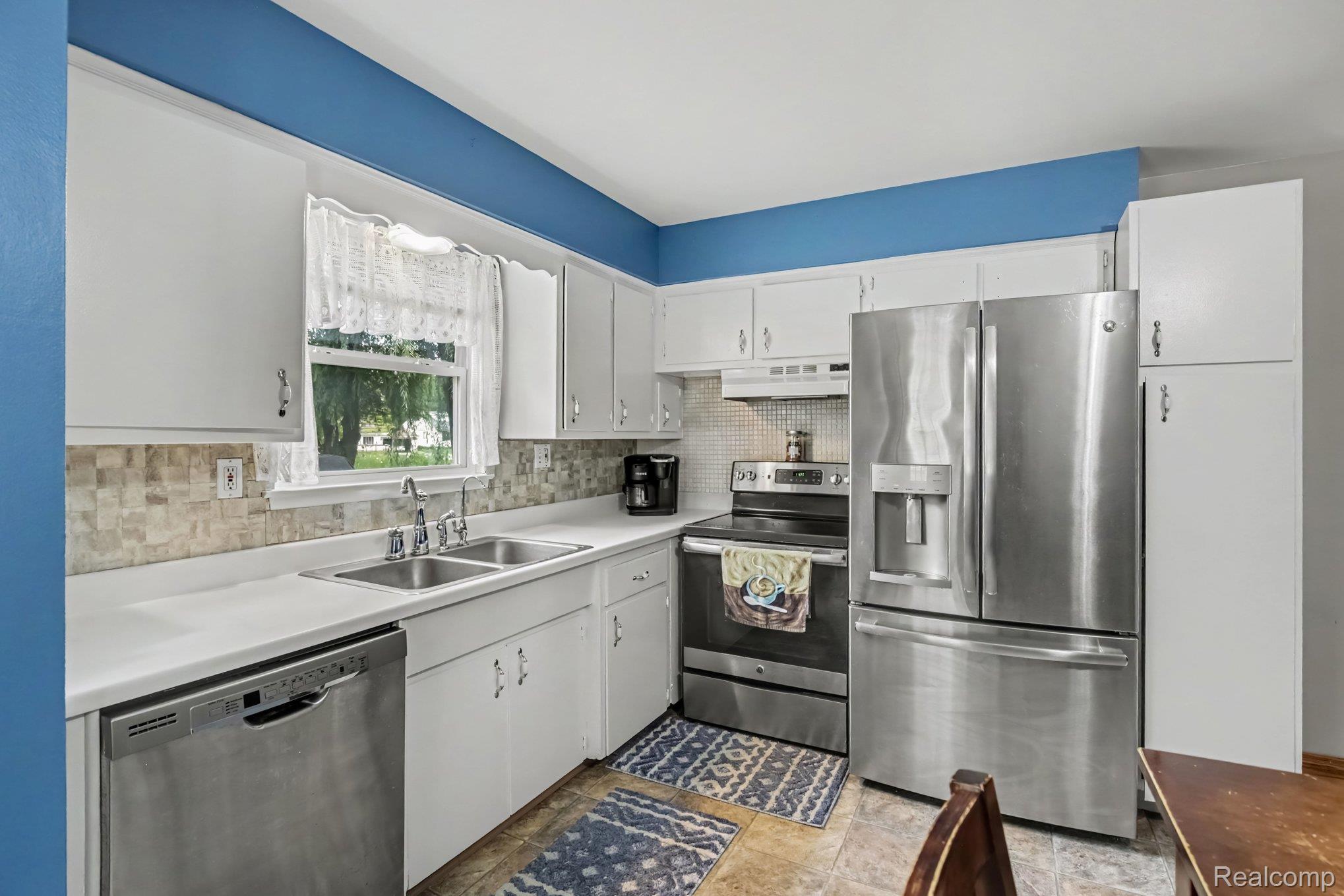 4726 Rosedale Court Clarkston, MI 48348 - Photo 5 of 30 Kitchen with stainless steel appliances & abundant cabinetry