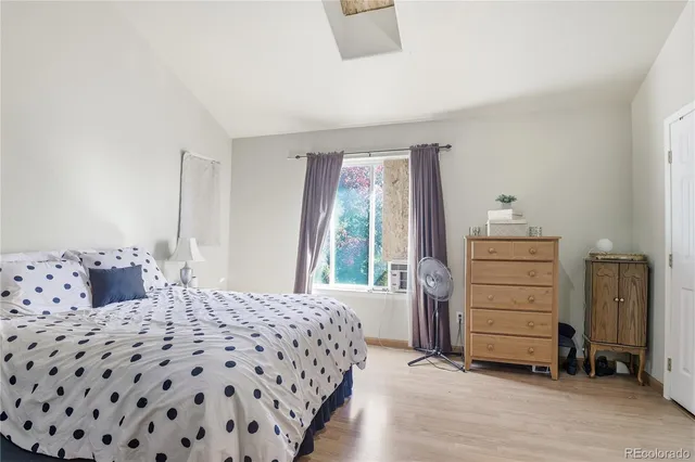 a bedroom with a bed and furniture