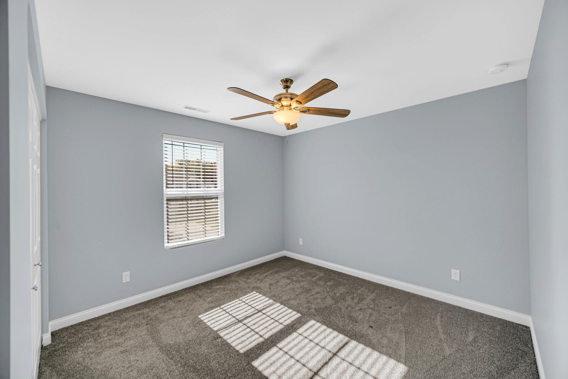 7428 East 120th Avenue Crown Point, IN 46307 - Photo 14 of 28 a view of an empty room with a window