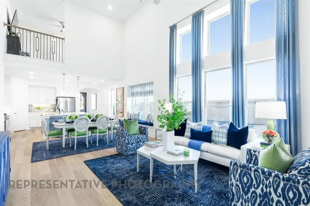 a living room with furniture and a table