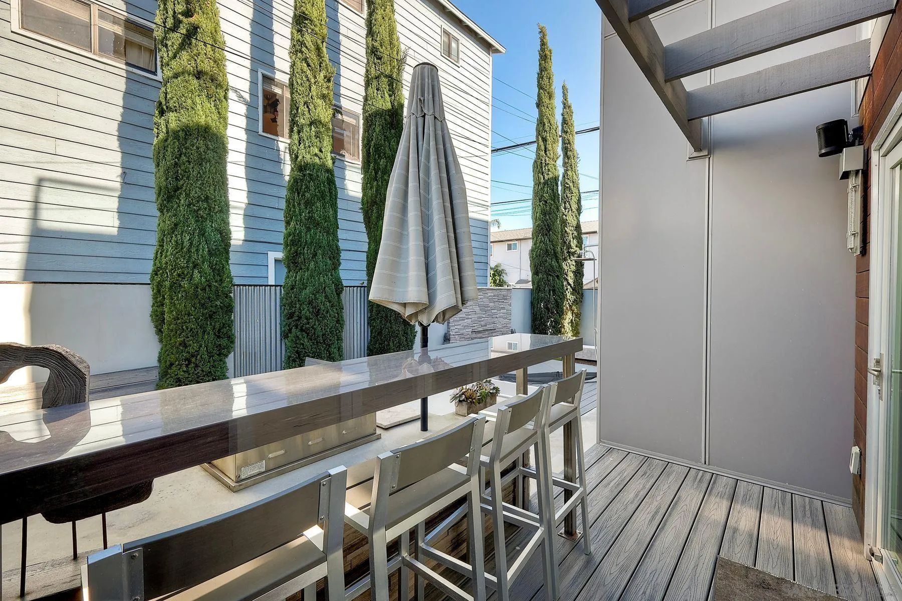 911 9th Street Coronado, CA 92118 - Photo 23 of 45 a view of a balcony with furniture and window