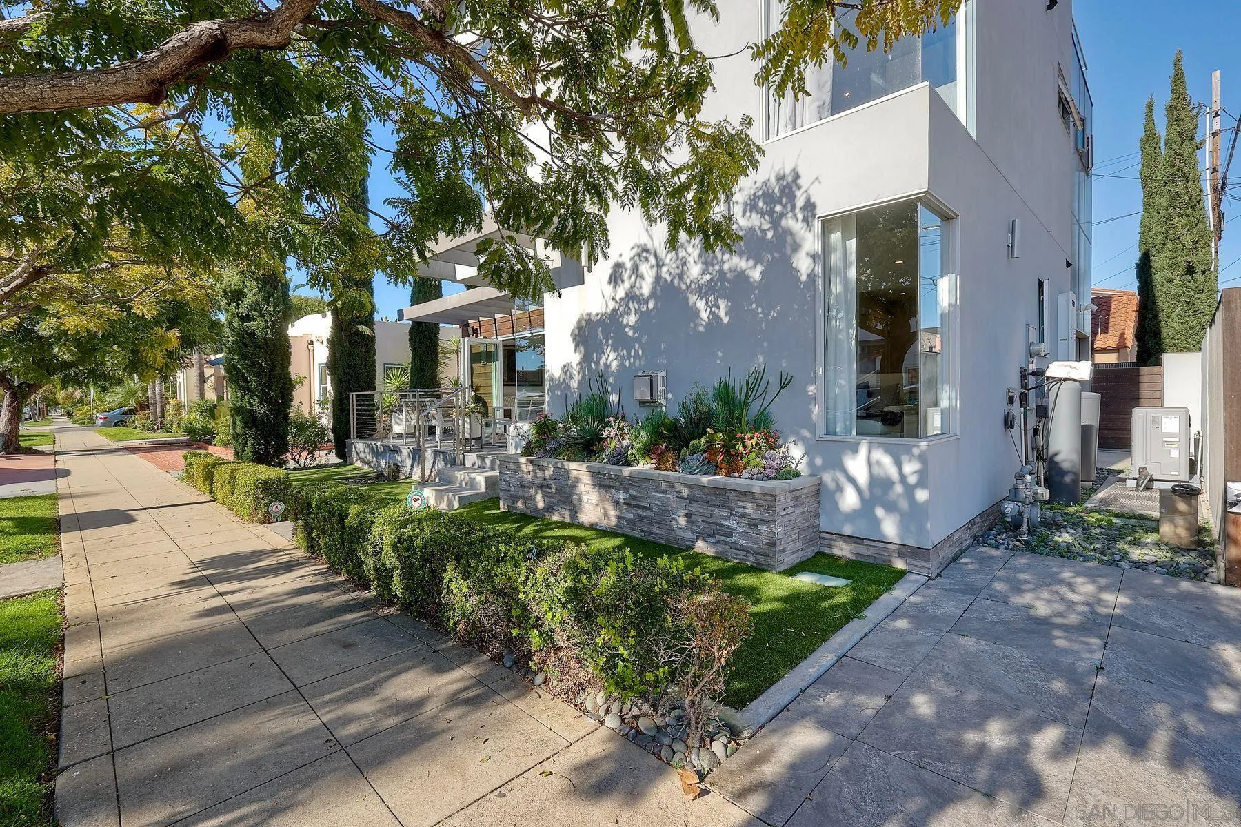 911 9th Street Coronado, CA 92118 - Photo 31 of 45 a view of a house with a yard and sitting area
